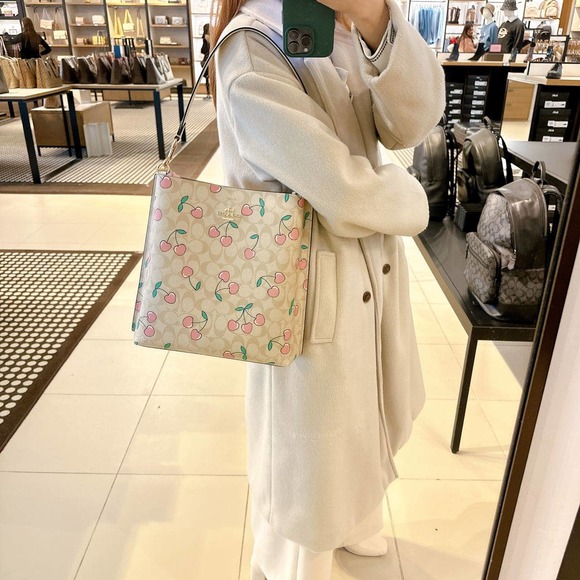 Coach Handbags - Coach CE611 Mollie Bucket Bag In Signature Canvas With Heart Cherry Print
